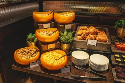 a display of food and pastries in a bakery at Dakota Edinburgh in Queensferry