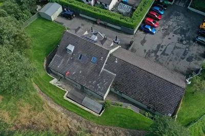 an overhead view of a house with a roof at Auld Mill House Hotel in Dunfermline