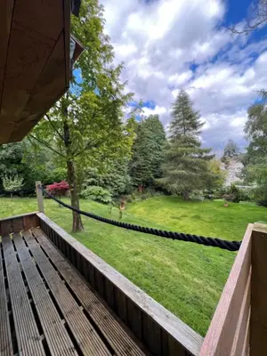 a deck with a view of a yard at Ivybank Villa in Rothesay