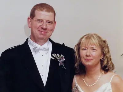 a man and a woman posing for a picture at Inverardran House in Crianlarich