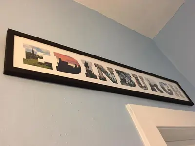 a picture hanging on a wall in a room at Watson Crescent in Edinburgh