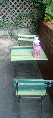 a picnic table with a pink item on top of it at Fountainbridge Flat in Edinburgh