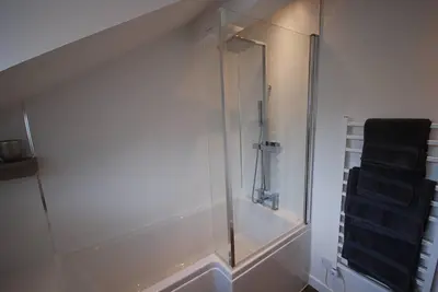 a bathroom with a shower with a glass enclosure at The Beeches at Gleneagles in Auchterarder