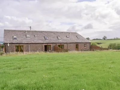 an old brick house in the middle of a field at The Ploughmans - Uk5531 in Kepculloch
