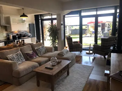 a living room with a couch and a coffee table at loch lomond apartments in Alexandria
