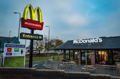 a mcdonalds restaurant with a sign in front of it at Eagles Land in Edinburgh