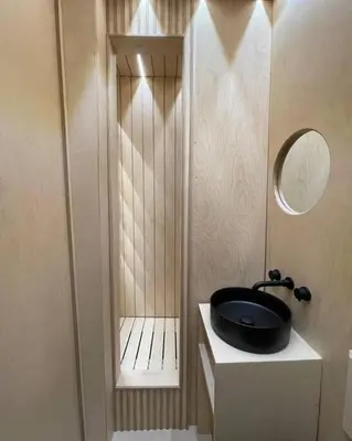 a bathroom with a black sink and a shower at Relax In Style In Edinburghs Buzzing West End in Edinburgh