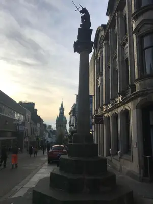 a pole in the middle of a city street at Millhill St Dunfermline in Dunfermline