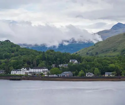 a view of a town and a body of water at Arrochar Hotel 'A Bespoke Hotel' in Arrochar