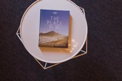 a book sitting on top of a plate at Historic Edinburgh 1890s Home Turned Relaxing Retreat in Edinburgh
