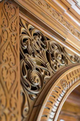 a wooden door with a design on it at Knockderry Country House Hotel in Cove