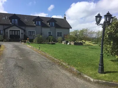 a street light in front of a house at Woodcockfaulds House in Stirling