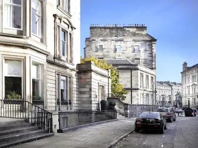 a car parked on a street in front of buildings at Hapimag Resort Edinburgh in Edinburgh