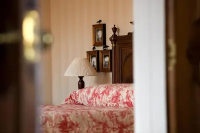 a bedroom with a bed with a lamp and a lampost at Hapimag Resort Edinburgh in Edinburgh