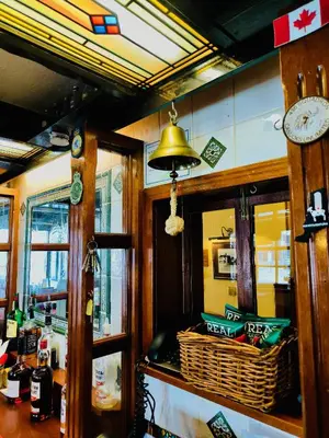 a kitchen with a clock and a basket of food at The Ayrshire and Galloway in Ayr