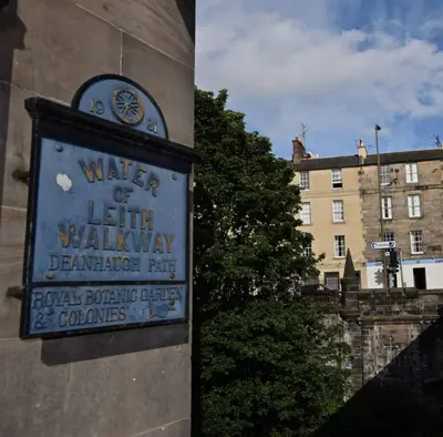 a sign on the side of a building at JOIVY Spacious Apt in New Town Prime Location in Edinburgh