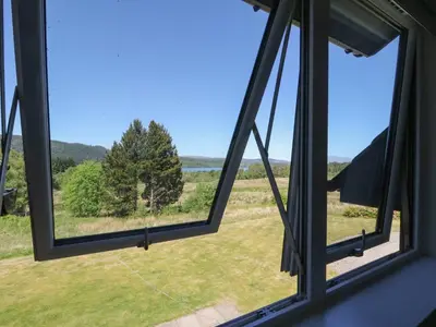 a view from a window looking out at a field at Sobrachan in Braevallich