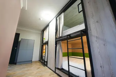 a room with two bunk beds in a building at Revolver Edinburgh in Edinburgh