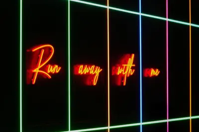 a close up of a neon sign that says rx pharmacy at Revolver Edinburgh in Edinburgh