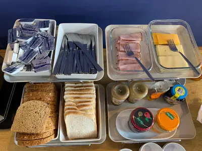 a lunch box filled with bread and meats and food at The Kelvin Hotel in Oban