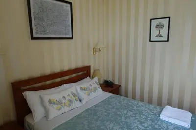 a bedroom with a bed with two pillows at Ashgrove House in Edinburgh