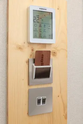 a digital scale on top of a wooden table at easyHotel Glasgow City in Glasgow