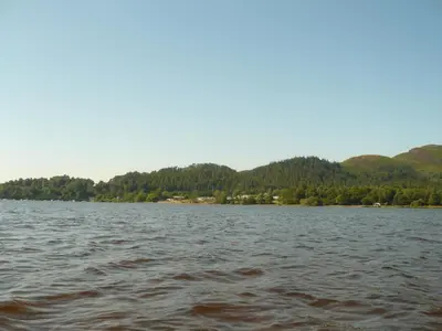 a large body of water with mountains in the background at Birchwood Guest Lodge in Balmaha
