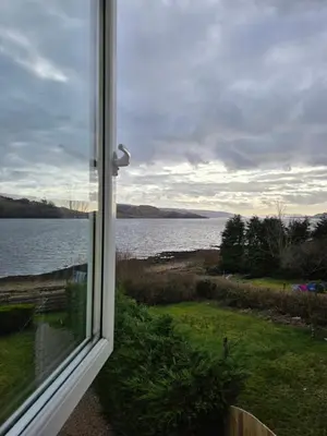 a view of a lake from a window at Tigh Na Mara in Furnace