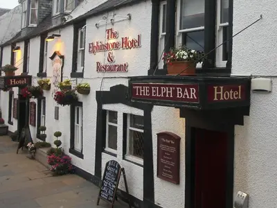 a building with a sign that reads the elephant bar at Elphinstone Hotel in Biggar