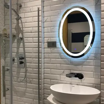 a bathroom with a sink and a mirror at 2 bed Chic Apartment in Glasgow City Centre in Glasgow