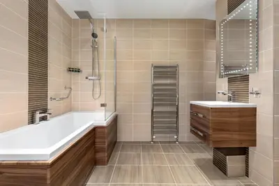 a bathroom with a tub and a sink at Wyndham Duchally Country Estate in Auchterarder