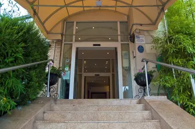 an entrance to a building with stairs in front at Avonbridge Hotel in Hamilton