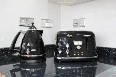 a black toaster sitting on top of a counter at The Marlfield in Bellshill
