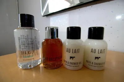 three bottles of hair products sitting on a table at The Marlfield in Bellshill