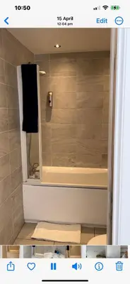 a room with a mirror and a chair in a room at West Highland Way Rooms ED30002F in Milngavie