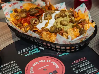 a bowl of food sitting on top of a table at ibis Styles Glasgow Central in Glasgow