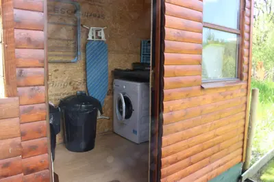 a view from the door of a caravan with a washing machine at Ben View in Taynuilt