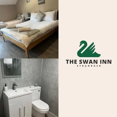 a hotel room with a bed and a bathroom at The Swan Inn in Stranraer