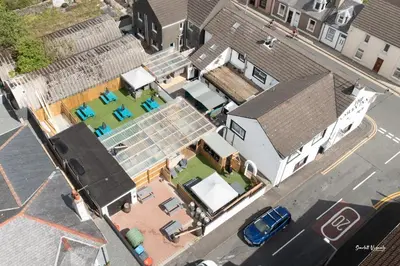 an overhead view of a house with a solarium at The Swan Inn in Stranraer