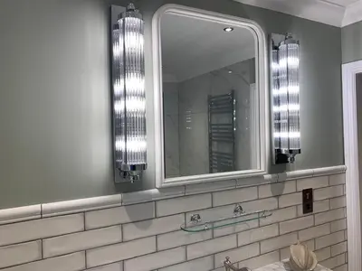 a bathroom with a mirror and a sink at Stormfront Luxury Hideaway Glencoe Ballachulish Highlands Near Fortwilliam in Glencoe