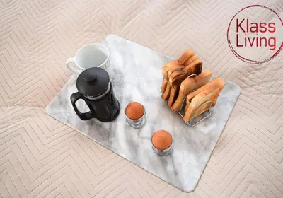a breakfast of pastries and coffee and eggs on a napkin at Whifflet Apartment by Klass Living Coatbridge in Coatbridge