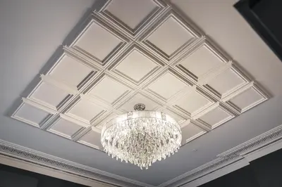a chandelier hanging from a ceiling at Bonnie Hotel - Smart Boutique ApartHotel - Haymarket Edinburgh in Edinburgh