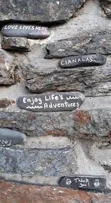 a stone wall with writing on it at Garragh Mhor in Oban