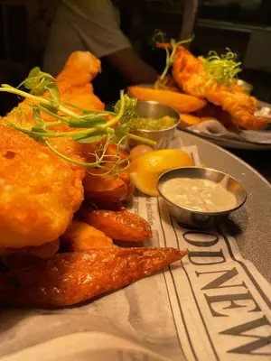 a plate of food with fried foods and dipping sauce at The Georgian hotel in Coatbridge