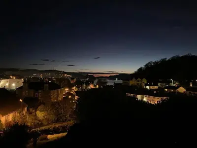 a view of a city at night at Dunrigh Guest House in Oban