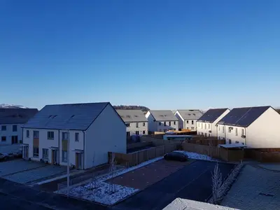 an aerial view of a row of houses at 7 Royal View Apartments in Stirling