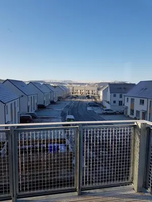 a view from a balcony of a row of houses at 11 Royal View Apartments in Stirling