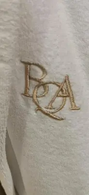 a close up of the word rave on a white shirt at Buccleuch and Queensberry Arms Hotel in Thornhill