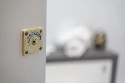 a close up of a light switch on a door at Bankton Rooms & Lodges in Livingston