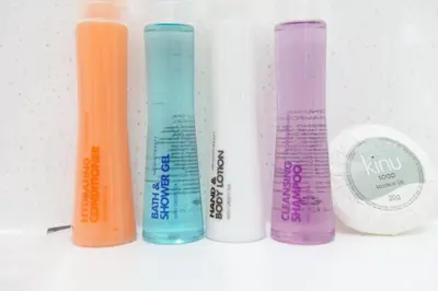 a row of different colored plastic tubes on a shelf at Super Prime Park View Duloch by TBA in Dunfermline